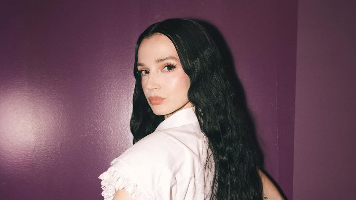 Hear POPPY’s moody cover of WHAM!’s “Last Christmas”