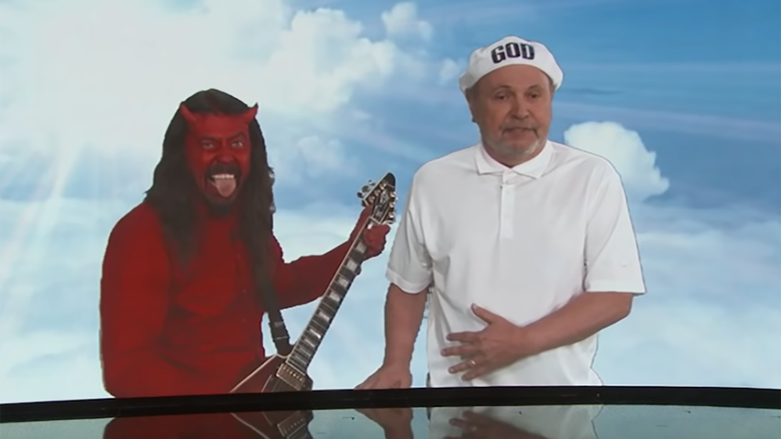 See Dave Grohl Play Satan and Battle Billy Crystal’s God on ‘Jimmy Kimmel’