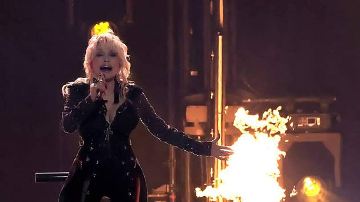 See DOLLY PARTON play new rock song “World on Fire” live for first time at ACM Awards
