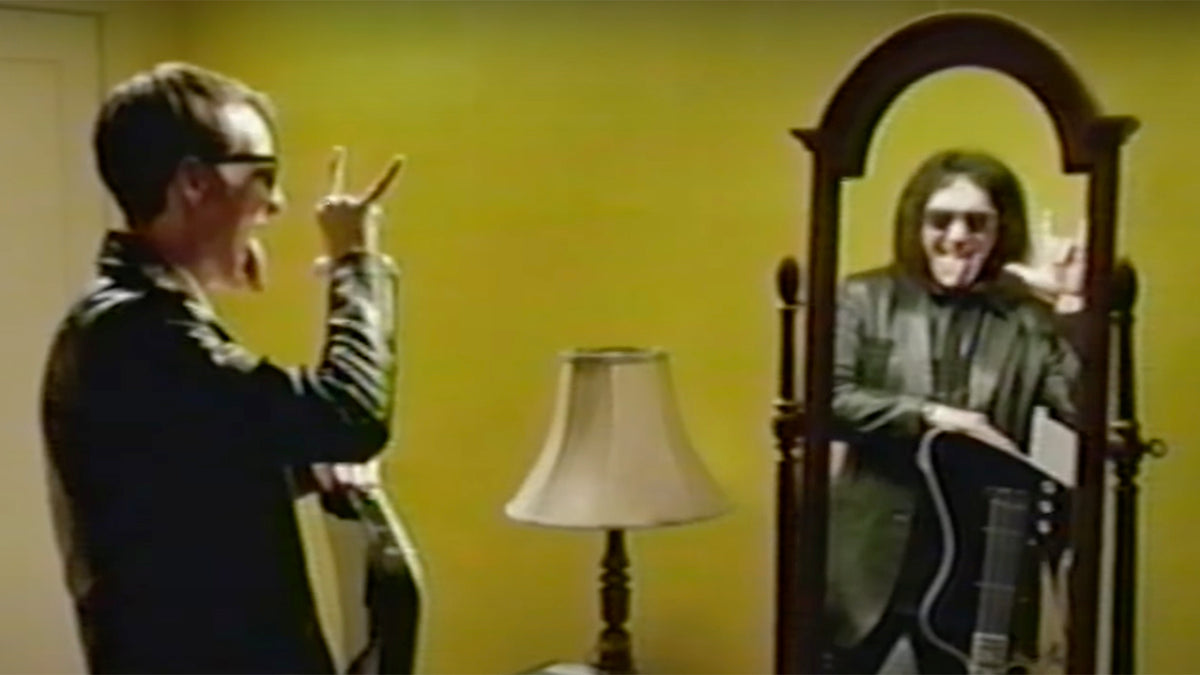 See KISS’ Gene Simmons Star in Hilarious 80s-Style Infomercial for New Signature Bass