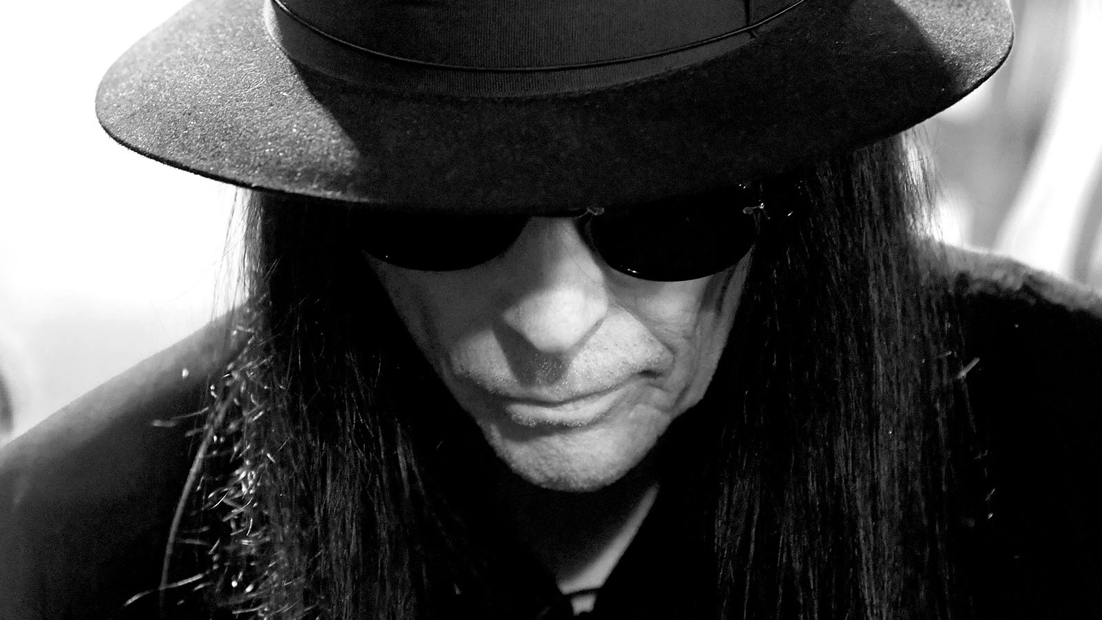 Hear MICK MARS lean into heavy side on debut solo song “Loyal to the Lie”