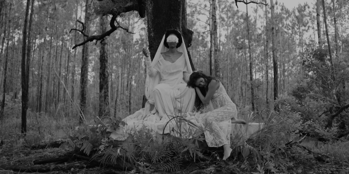 Watch King Woman’s Haunting, Surreal “Manna” Video