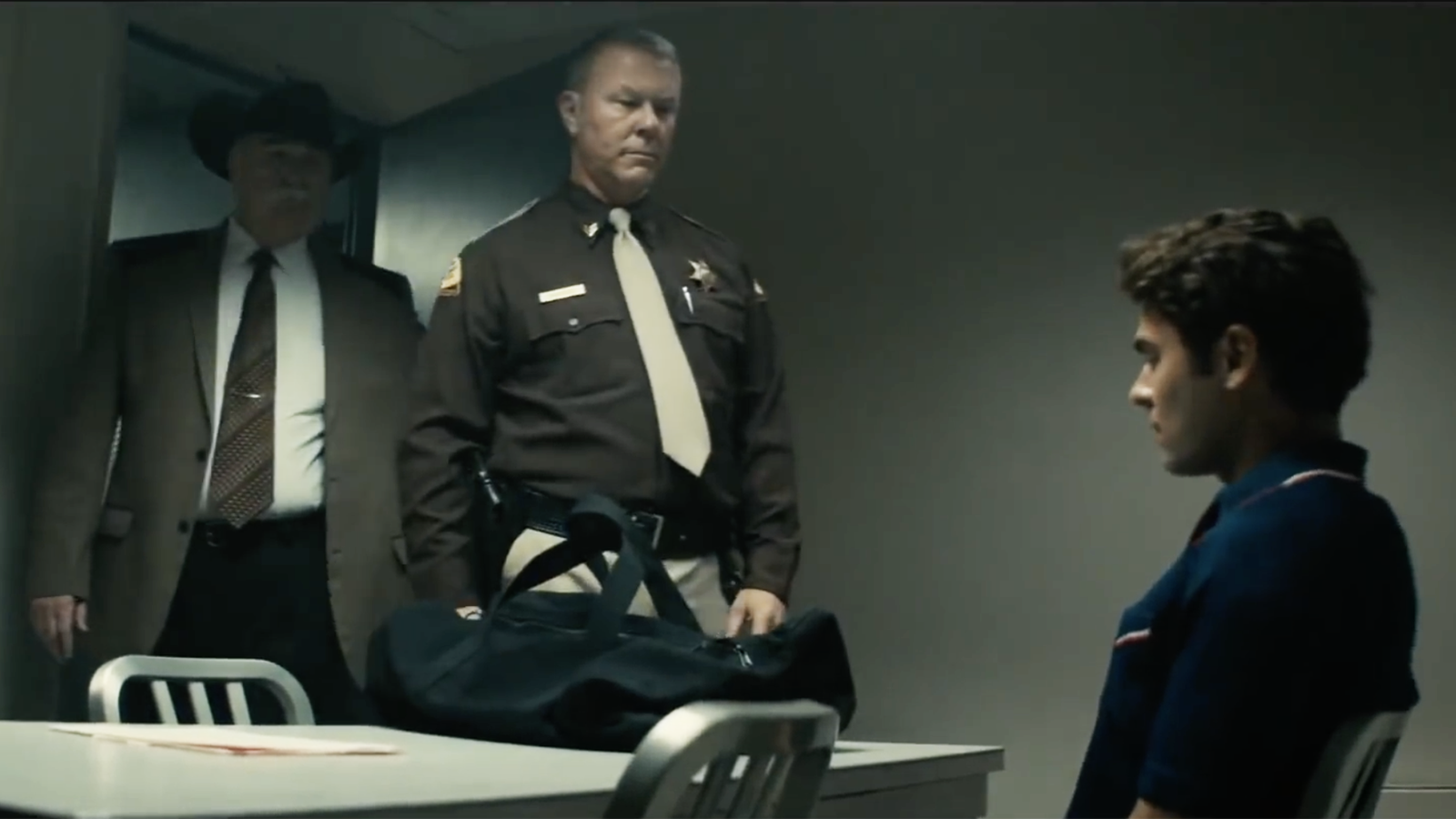 See James Hetfield’s Cop Face Zac Efron’s Ted Bundy in ‘Extremely Wicked’ Trailer