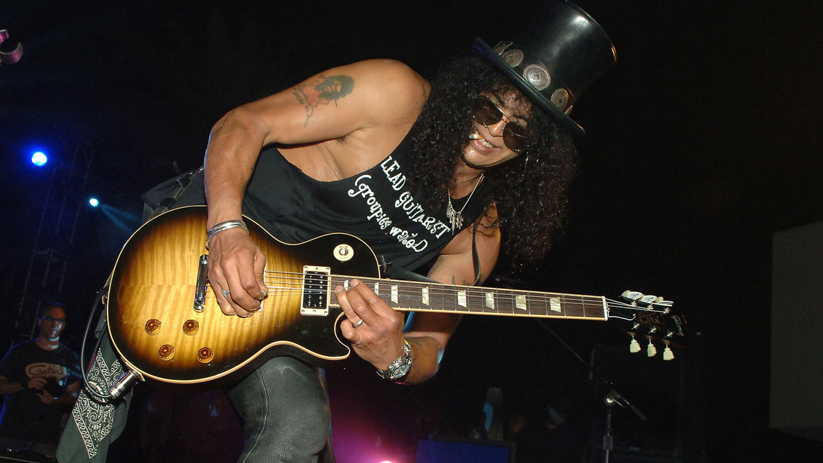 Inkspot: Guns N’ Roses’ Slash Shows Off His Favorite Tattoos