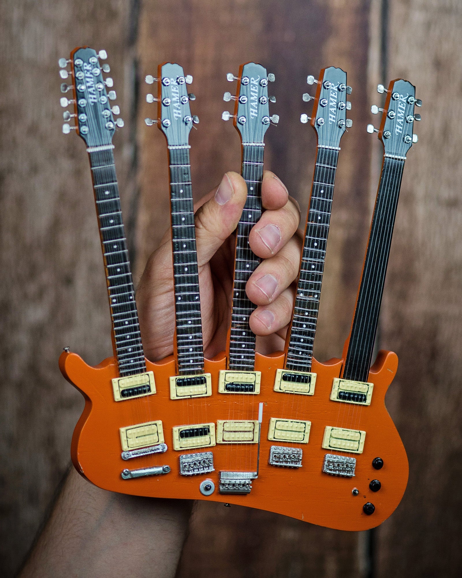 RICK NIELSEN™ FIVE-NECK ORANGE MONSTER MINI GUITAR REPLICA COLLECTIBLE - OFFICIALLY LICENSED