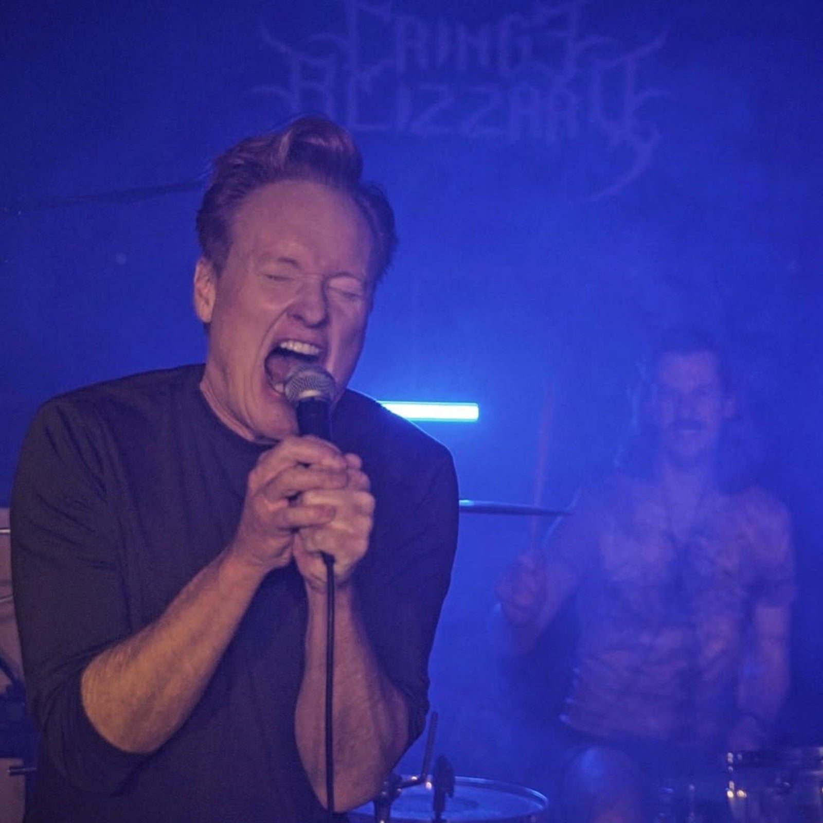 See CONAN O’BRIEN scream onstage with “slush metal” band CRINGE BLIZZARD