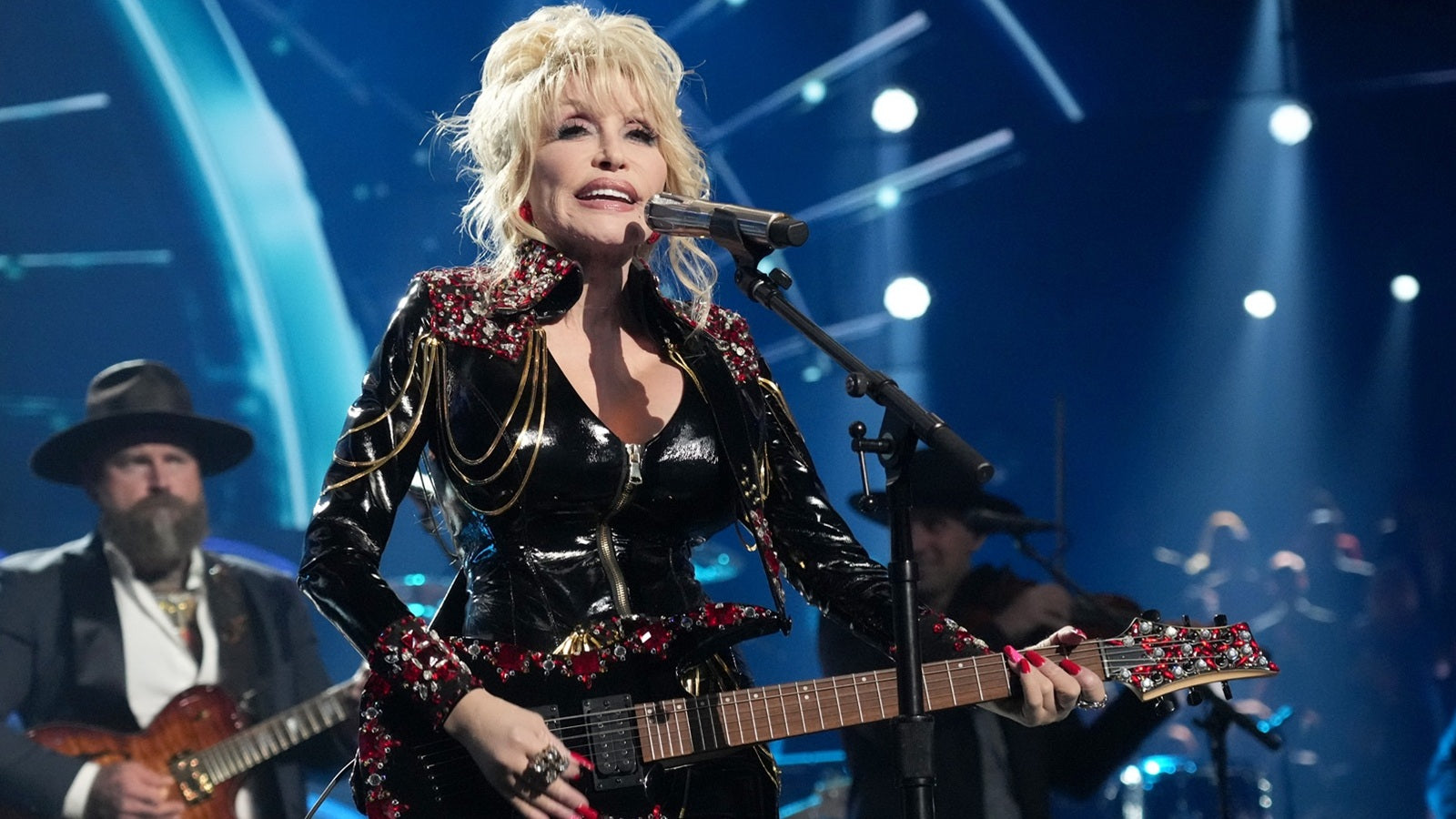 DOLLY PARTON, country-music icon and ‘Rockstar’, dead at 80