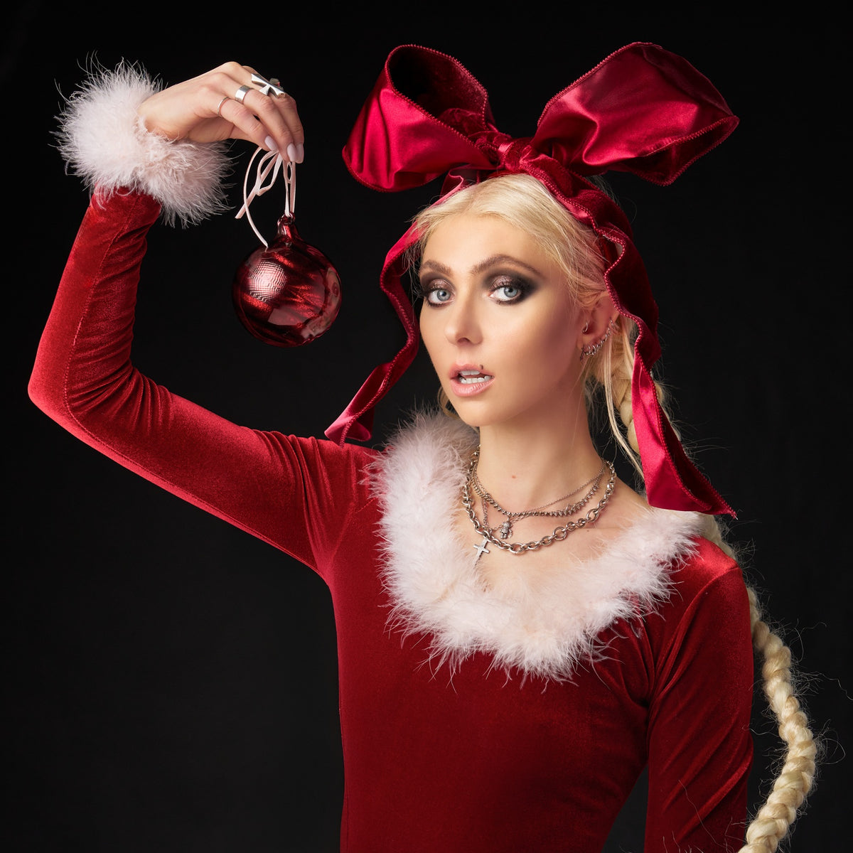 Hear THE PRETTY RECKLESS’ TAYLOR MOMSEN duet with childhood self on “Where Are You Christmas”