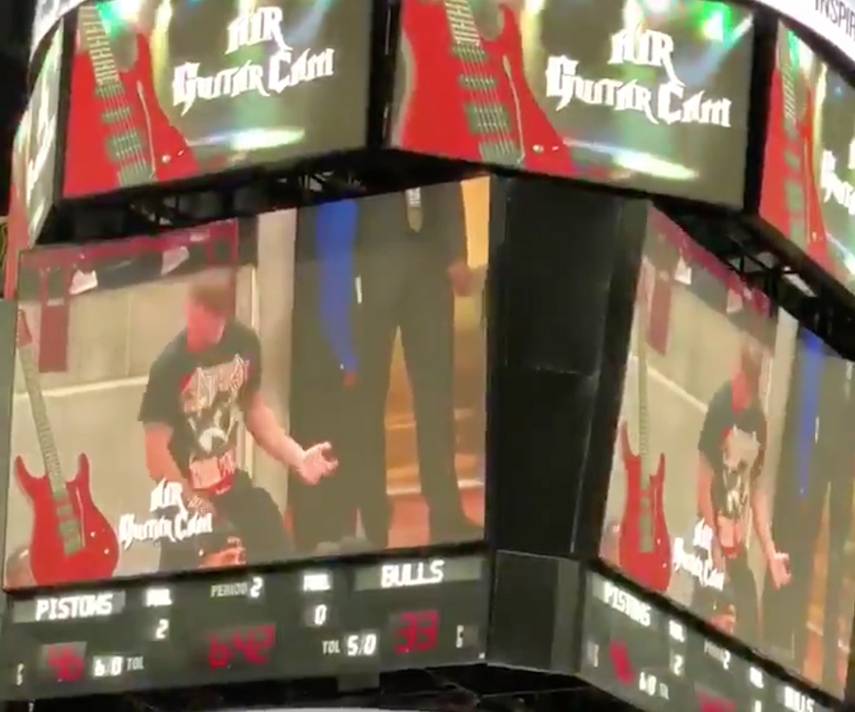 Watch Fan Unleash Epic Air-Guitar Performance to Power Trip at Chicago Bulls Game