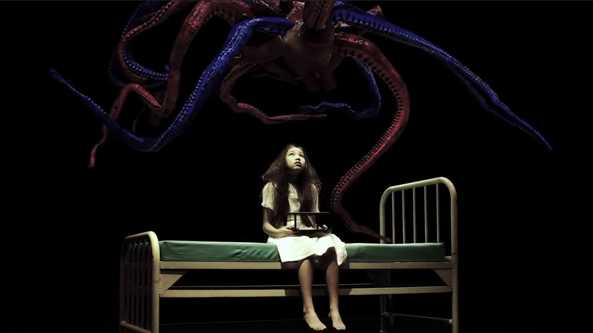 Watch A Perfect Circle’s Haunting New “Eat the Elephant” 2D Holographic Video