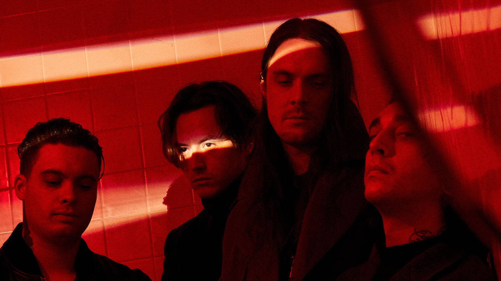 Hear BAD OMENS team with HEALTH on heavy new song “THE DRAIN”