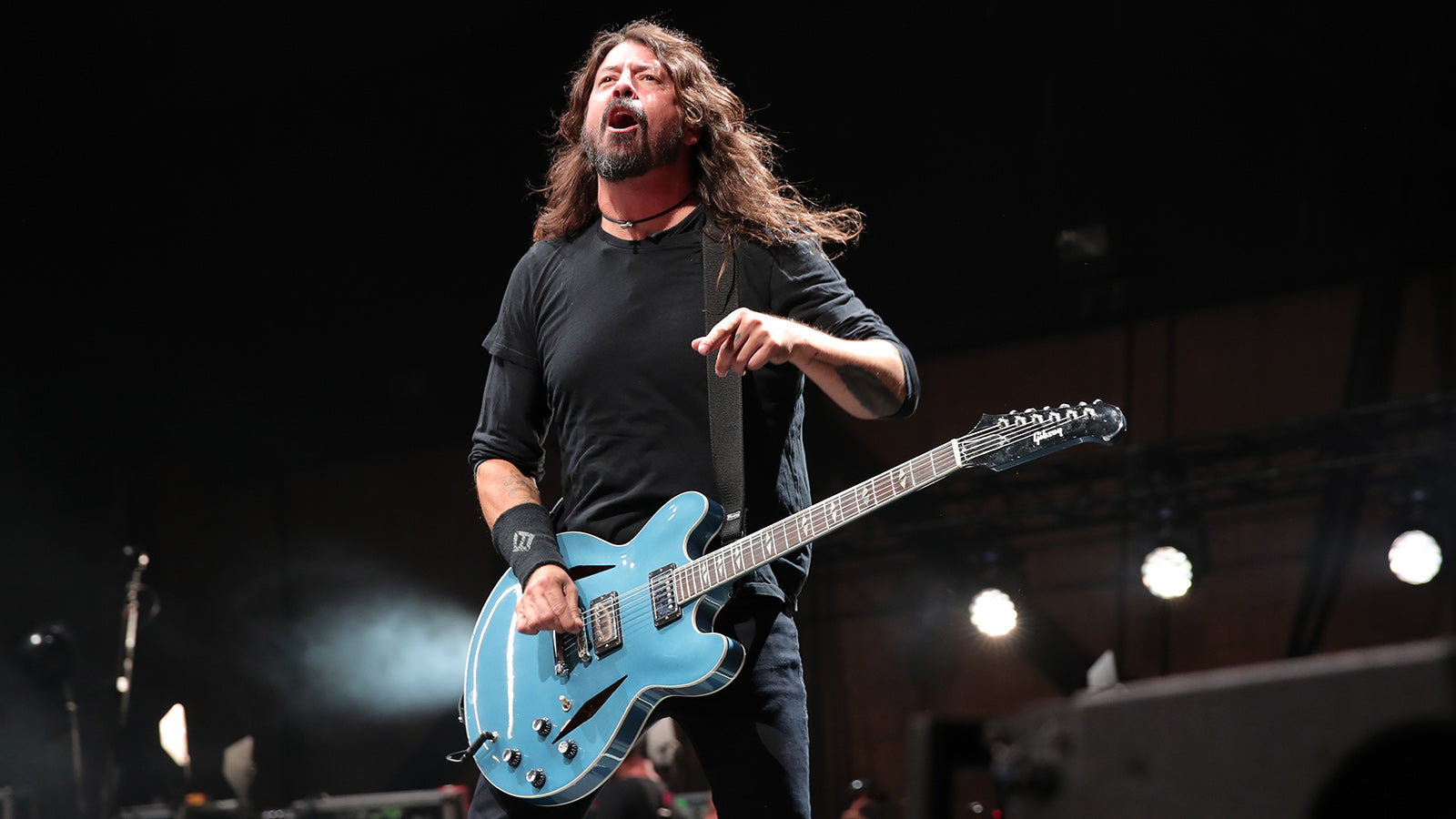 Watch Foo Fighters’ Dave Grohl Fall Off Stage After Chugging a Beer