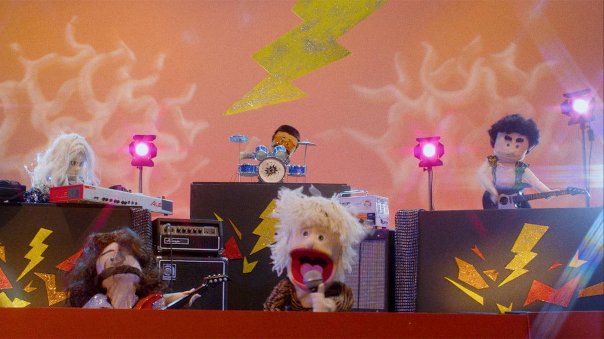 See glam-metal puppets rock in GLITTER WIZARD’s fun new “Glitterati” video