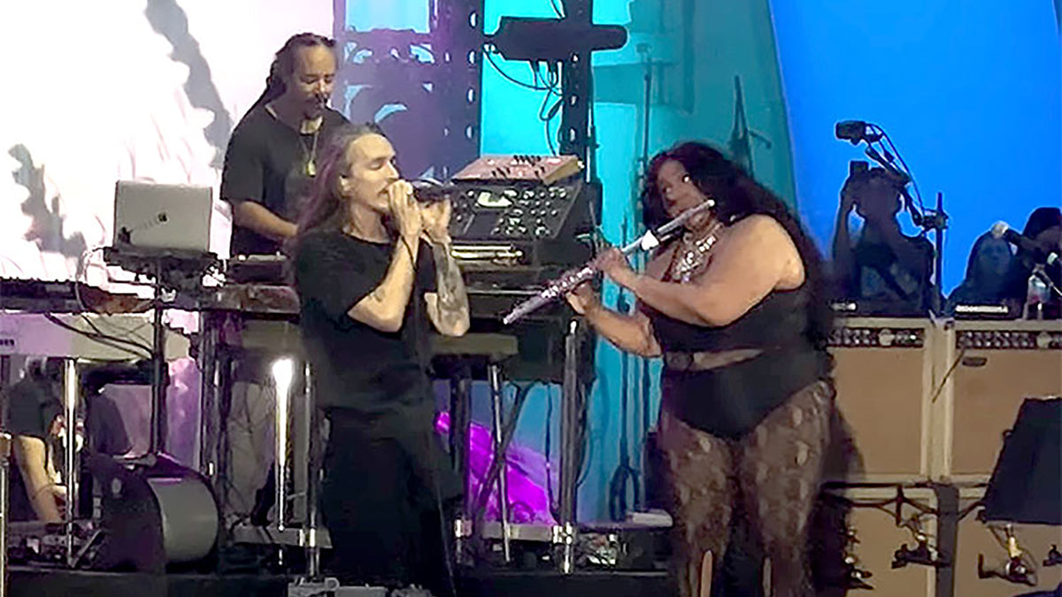WTF?! See LIZZO join INCUBUS onstage to play flute during “Aqueous Transmission”