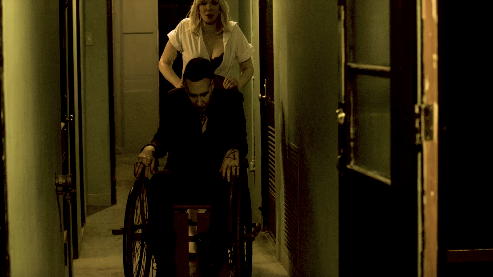 See Marilyn Manson Nursed to Insanity by Courtney Love in “Tattooed In Reverse” Video