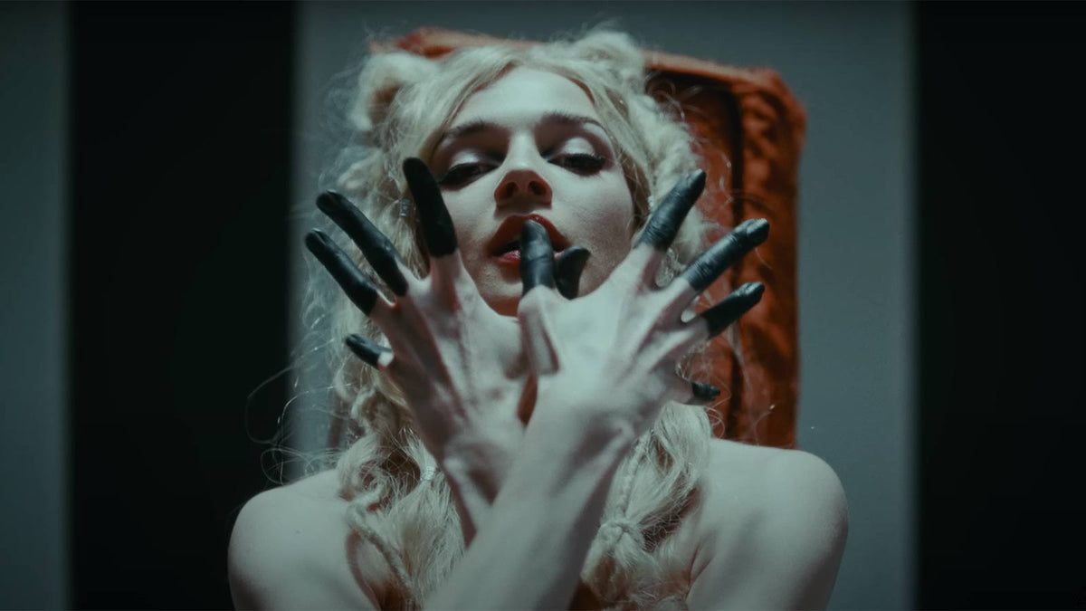 Hear POPPY yearn for “that real shit” on dark new song “Knockoff”