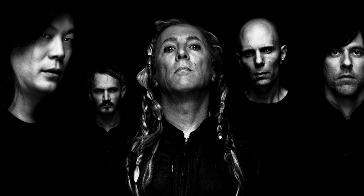 Watch A Perfect Circle Glitch Out in Stark, Eerie New “The Doomed” Video