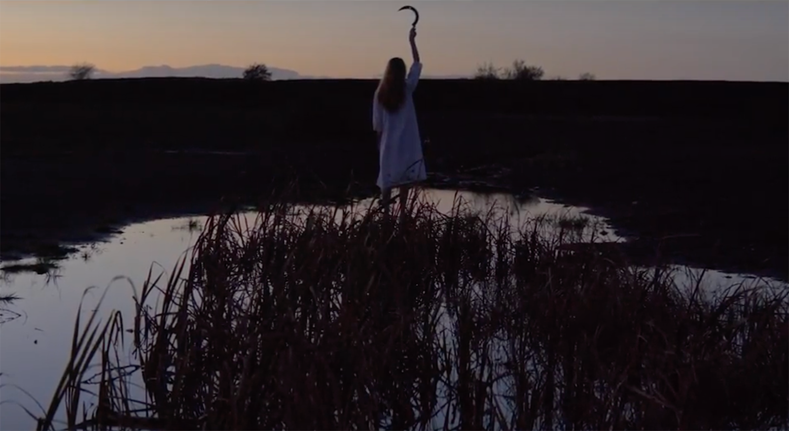 Creepy Priest Meets Woman With Sickle in Tribulation’s Dramatic “The Lament” Video