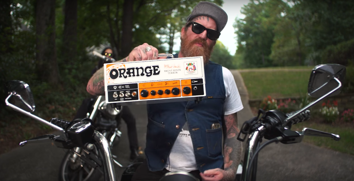 Watch Brent Hinds Ride Motorcycle, Astound Metalheads in Orange Amp Commercial