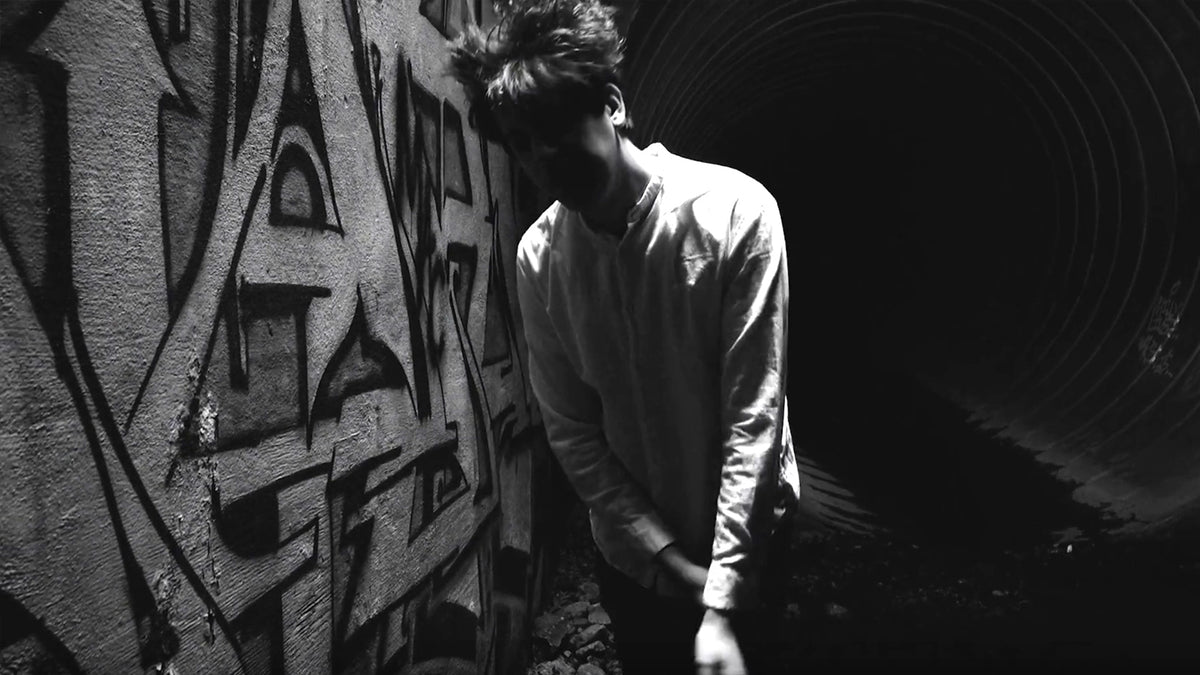 See Single Lash Create Subterranean Goth Dream in Surreal “Broken Tongue” Video