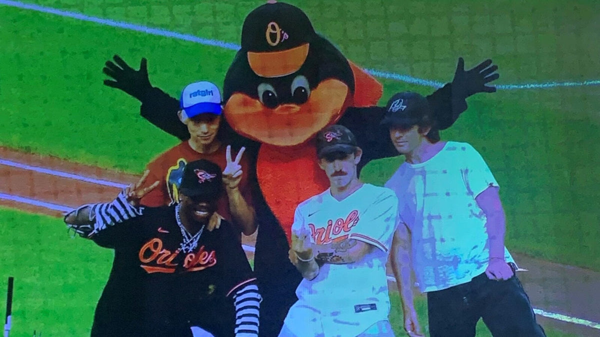 See TURNSTILE throw out first pitch at Baltimore Orioles game