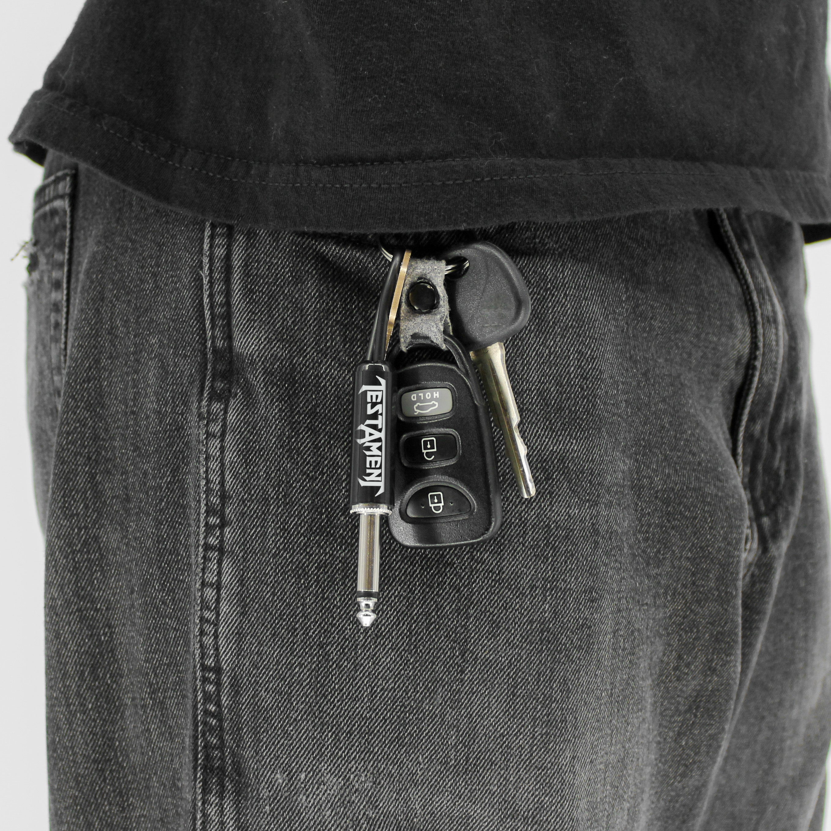 TESTAMENT LOGO GUITAR PLUG KEYCHAIN