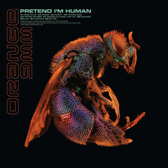 ORANGE 9MM 'PRETEND I'M HUMAN' IMPORT COLOR VINYL LP
